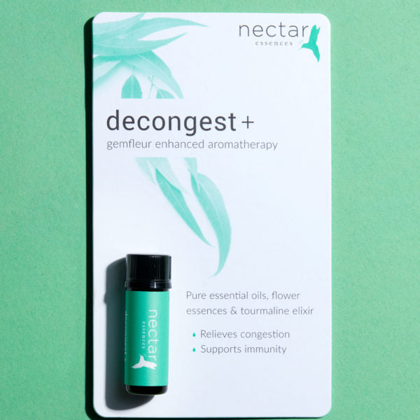Product card for 'decongest + gemfleur enhanced aromatherapy.' Features a teal-labeled oil bottle and text listing benefits: relieves congestion and supports immunity