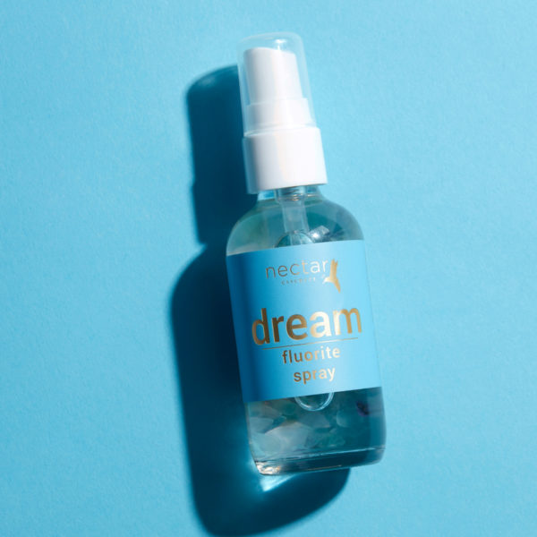 A simple and clear veiw of dream spray by Nectar Essences with its theme color background
