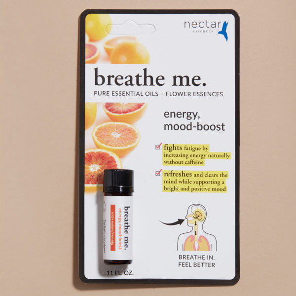 Small packing of breathe me essential oil energy mood boost with beige background