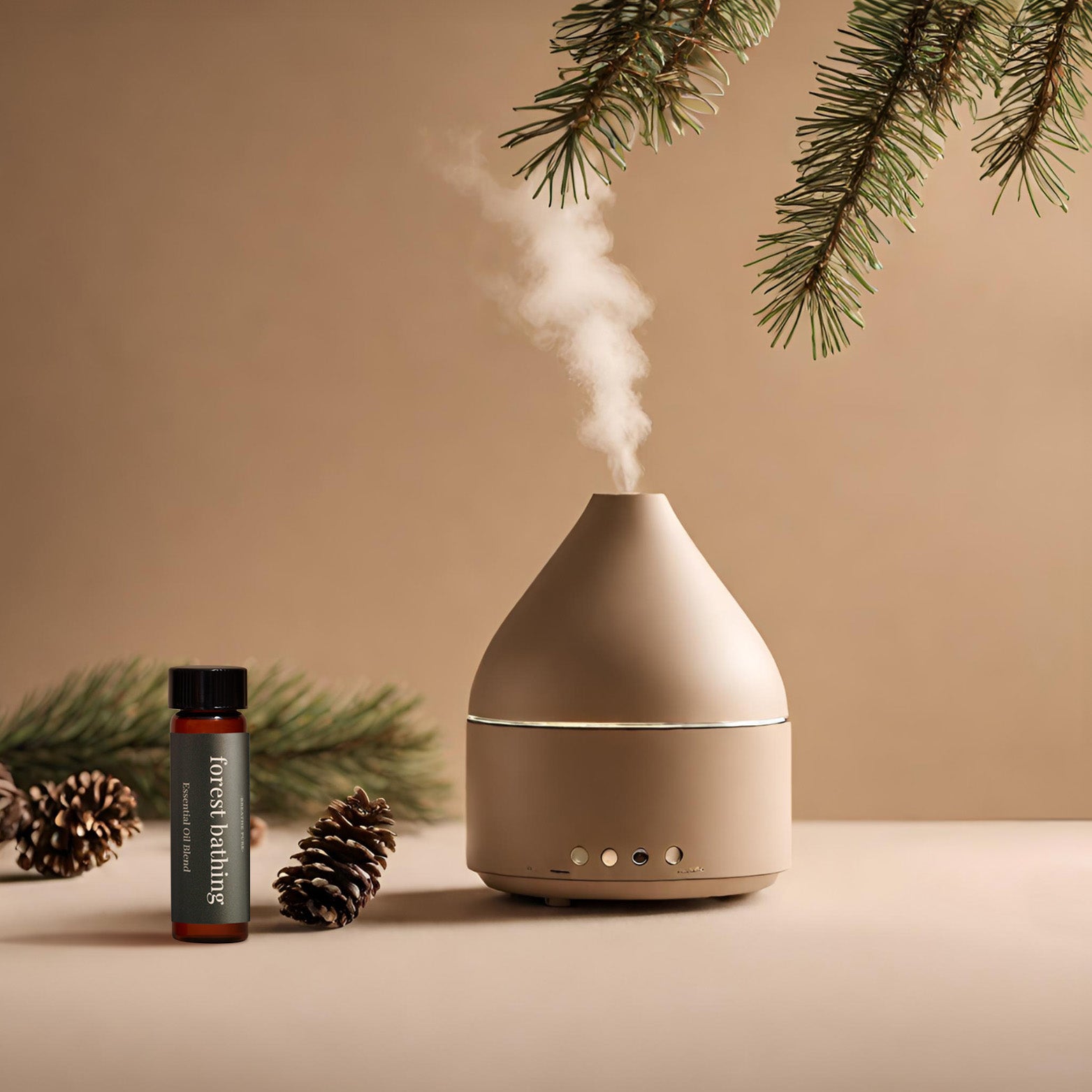 Forest Bathing Essential Oil next to a modern aromatherapy diffuser emitting steam, surrounded by pine branches and pine cones.